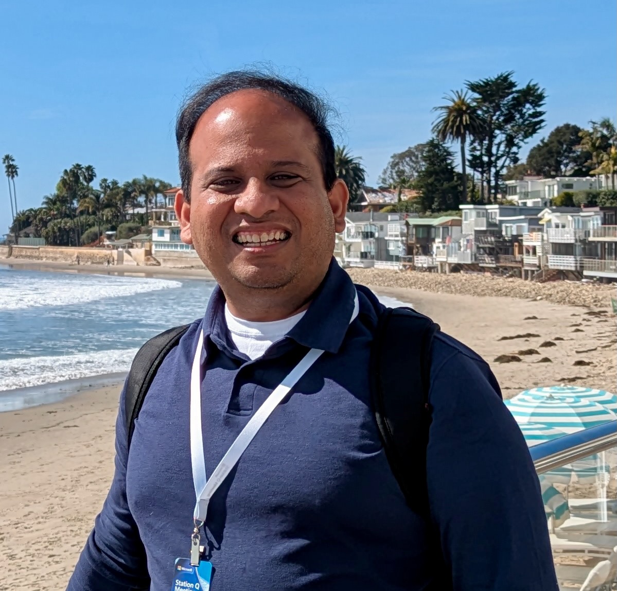 Professor Jay Deep Sau standing on a beach.